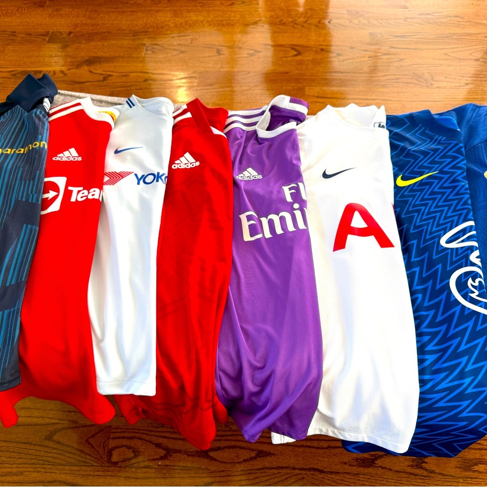 EIGHT (8) Nike Puma and Addidas Soccer Jerseys sizes vary S - M